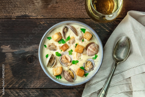 Fotografie, Tablou Bowl of clam chowder soup, overhead shot, with copy space