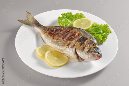 Dish with grilled fish gilthead bream