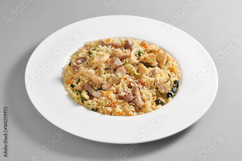 Dish of cous cous and meat