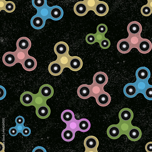 Hand Spinner Seamless pattern. Vector illustration on black background. Fidget toy photo