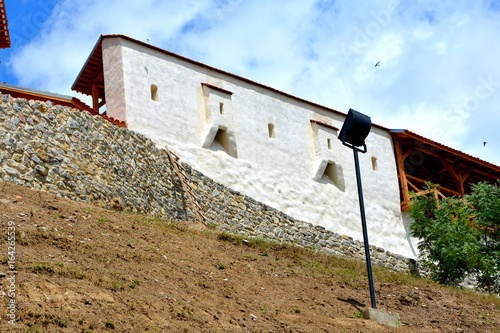 Medieval teutenic fortress in the village Feldioara, Transylvania. Built in the XII th century. photo