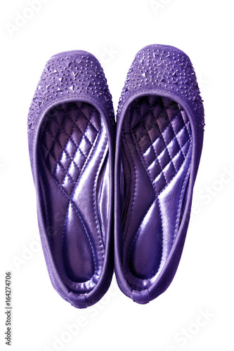 Lady purple leather shoes isolated on a white, top view