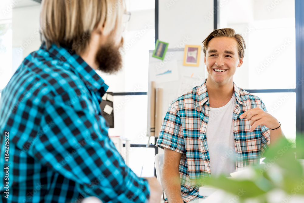 Fototapeta premium Two office workers at the desk