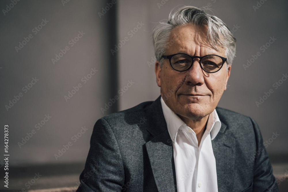 Portrait of confident senior businessman Portrait of confident senior businessman