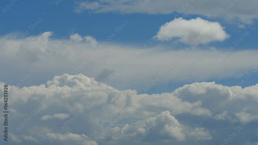 Clouds passing over a deep blue sky. Time lapse. Clouds passing over a deep blue sky. Time lapse.