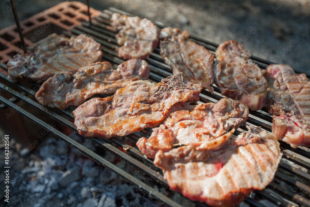Delicious grilled meat on a barbecue Delicious grilled meat on a barbecue