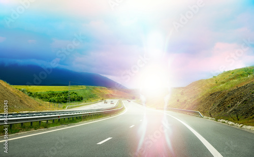 Beautiful abstract angel on a highway, protection drive concept