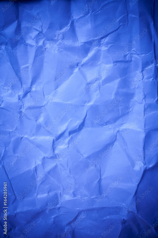 Obraz premium Blue crumpled paper texture background.
