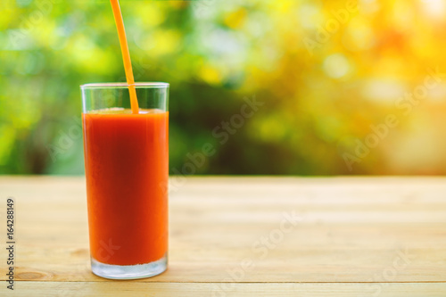 Pouring tomato juice into a...