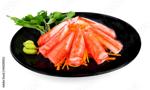 Decorate crab stick in white plate Japanese food on white background