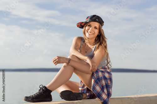 Portrait of young beautiful girl in grunge style