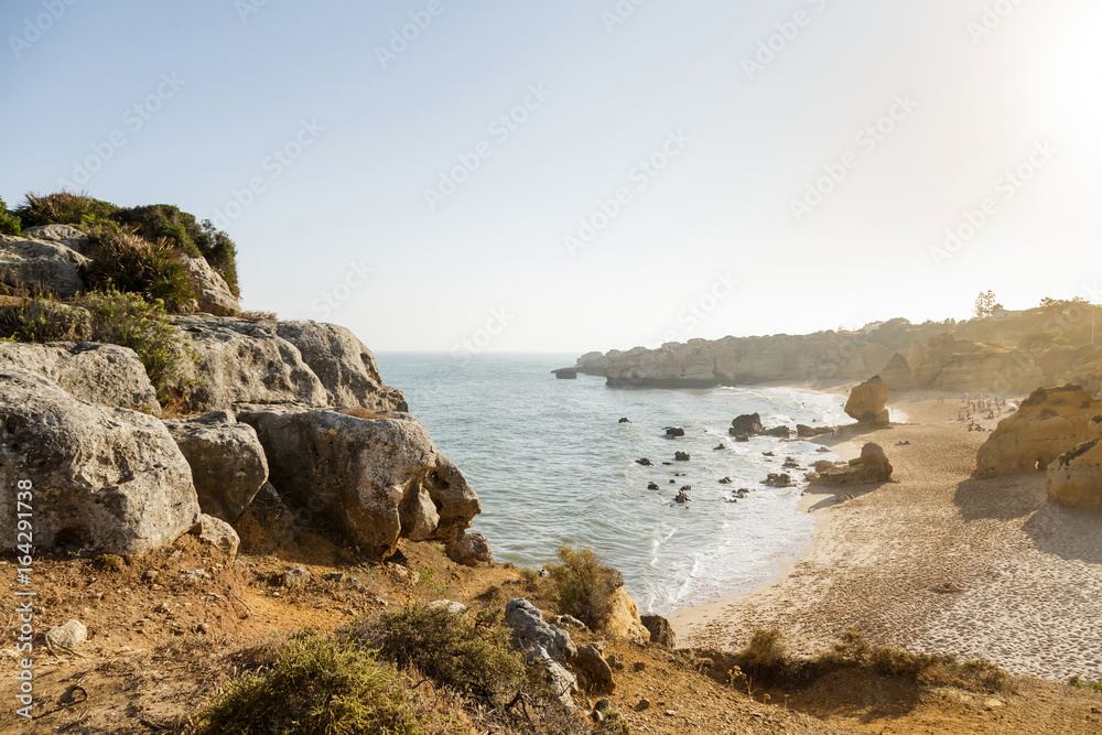 Cliffs with empty beach in Algarve at south of Portugal Cliffs with empty beach in Algarve at south of Portugal