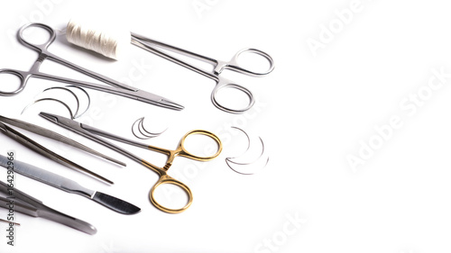 Set of surgical instruments on white background