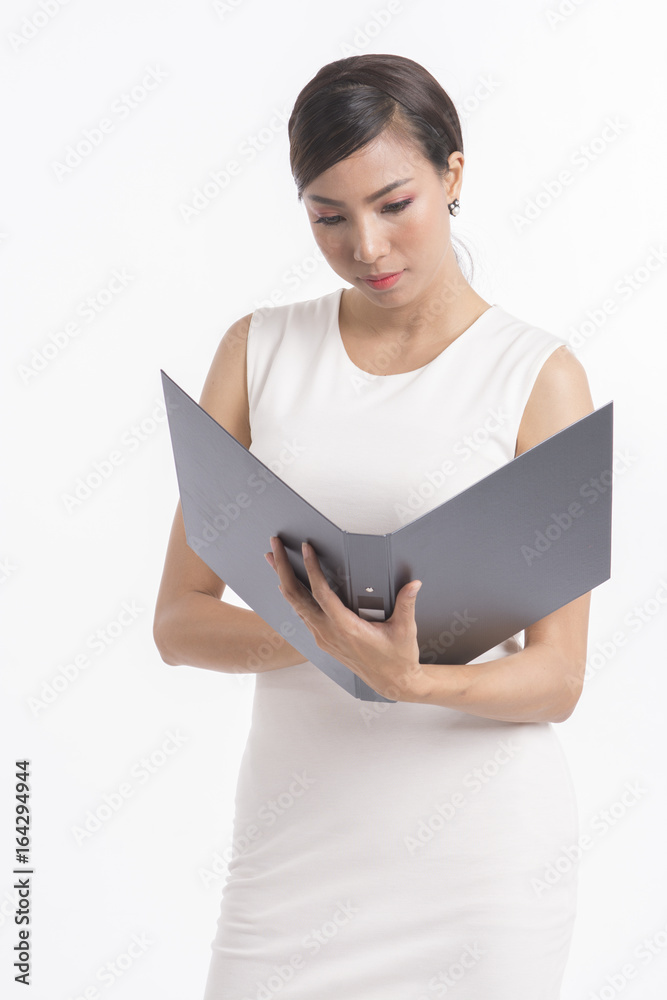 Business woman standing, holding file and waring white dress on white background