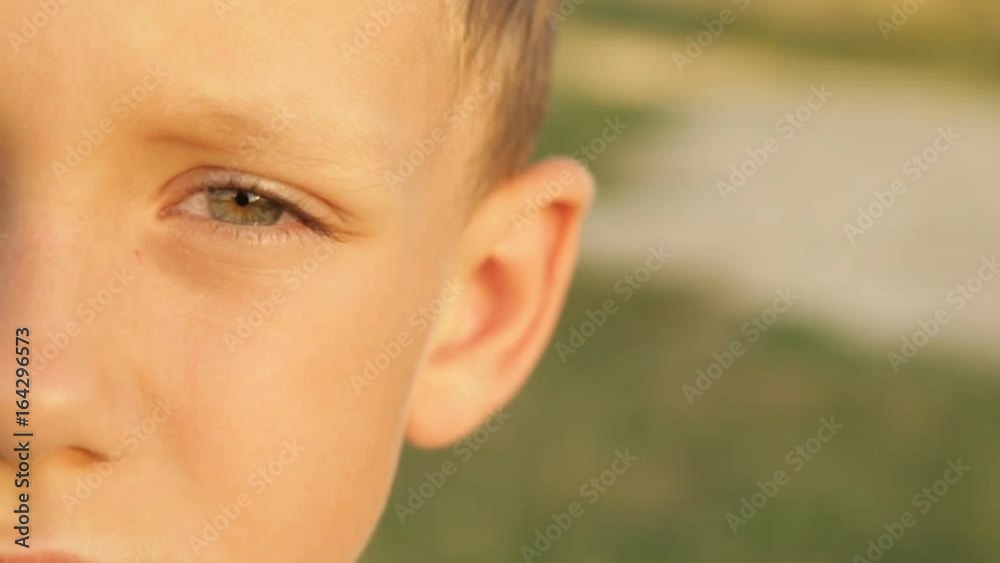 Part of the pensive boy's face Part of the pensive boy's face