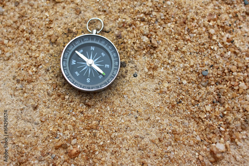 campass on sand
