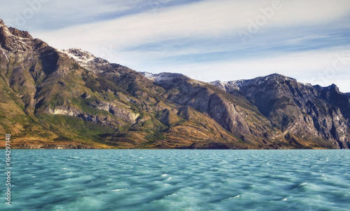 Cruising in Glacier Alley. Patagonia, Argentina, South America. Landscape of beautiful mountains and blue water. Fjords photo