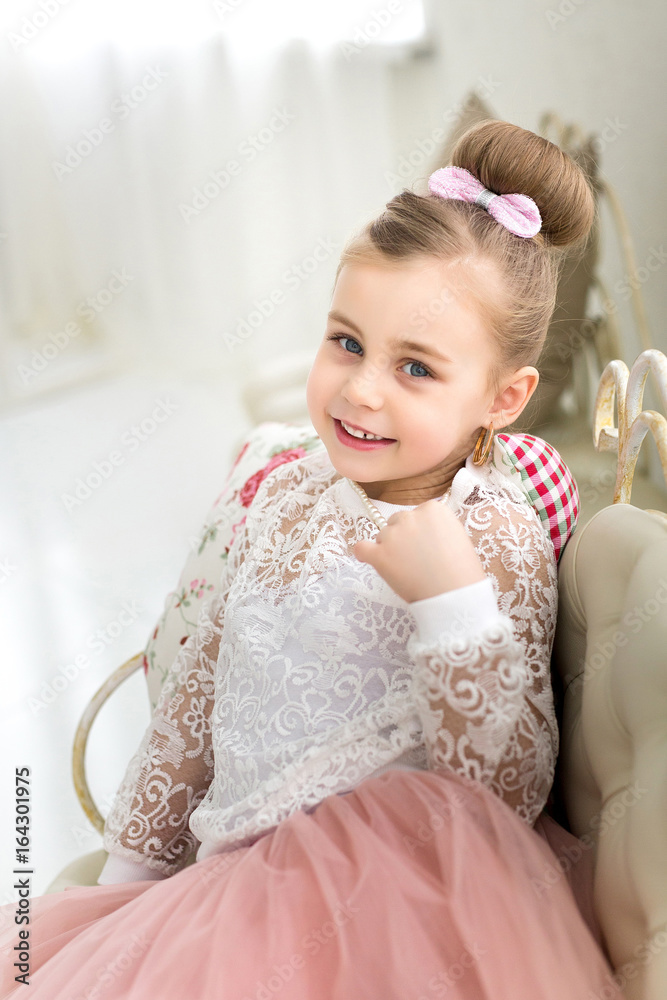 Portrait of a beautiful smiling little girl in the studio Portrait of a beautiful smiling little girl in the studio