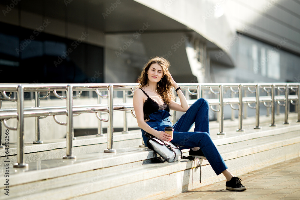 young beautiful stylish hipster woman drinking coffee in paper cup young beautiful stylish hipster woman drinking coffee in paper cup