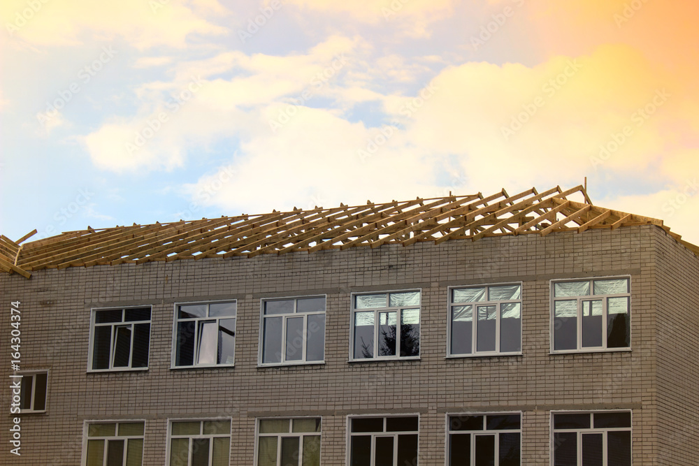 Roof overlapping on a multi-storey building, under the sky Roof overlapping on a multi-storey building, under the sky