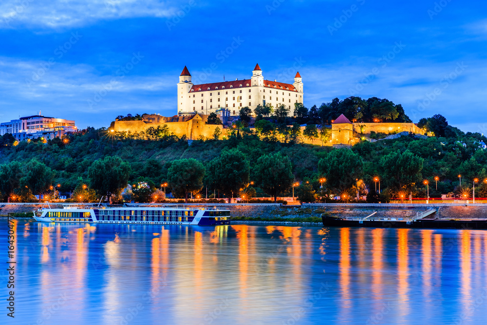 Bratislava, Slovakia. View of the Bratislava castle and Danube river at the twilight.
