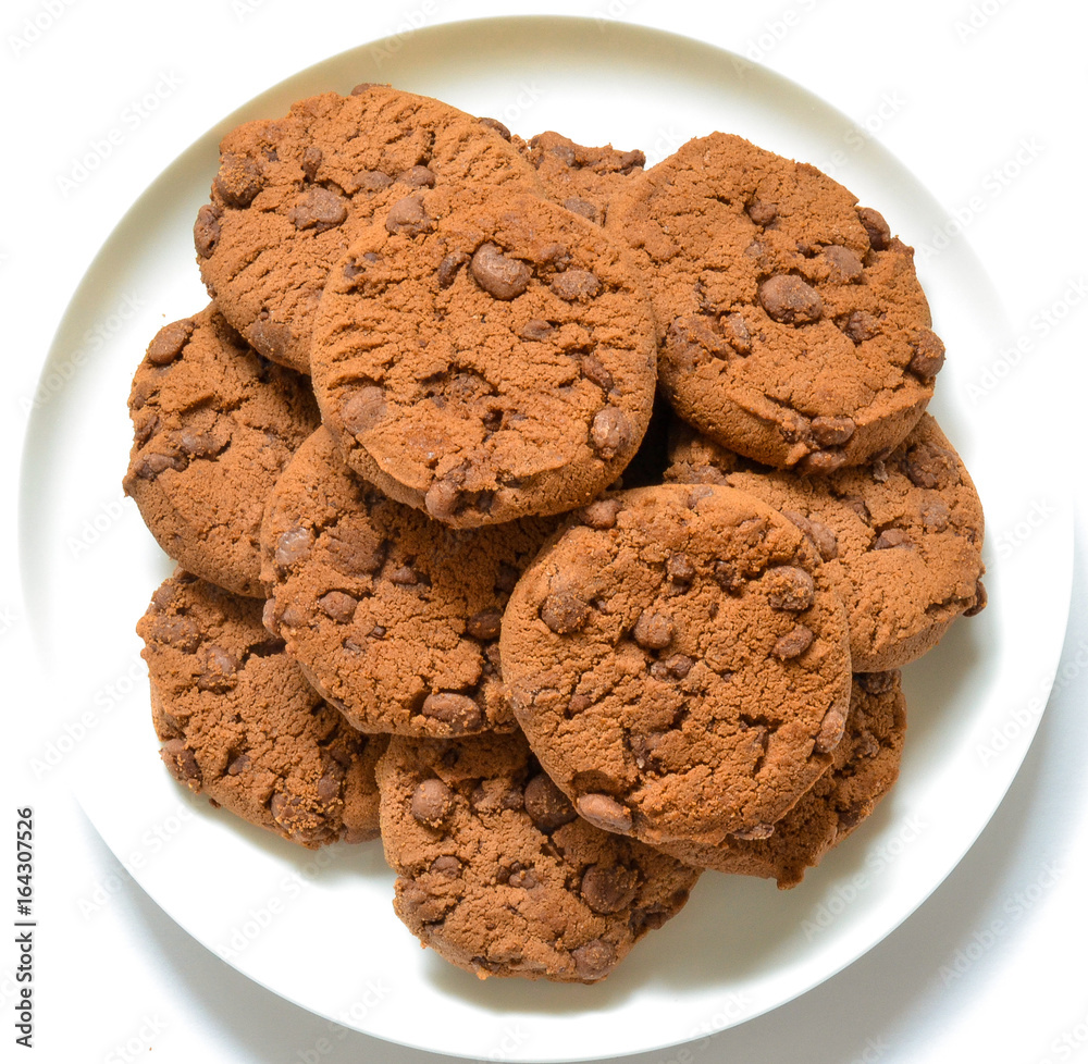 Cookies with chocolate on a white plate. Isolated background
