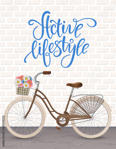 Retro bycicle with basket of flowers. Healthy lifestyle, fitness.