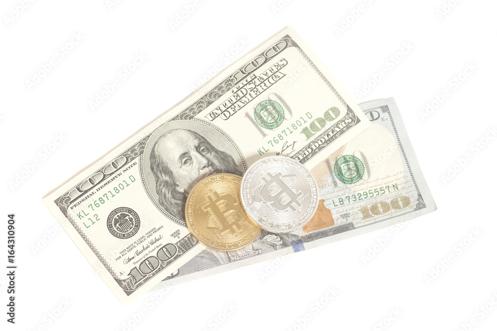 Golden end silver bitcoins with U.S. dollars isolated on white Golden end silver bitcoins with U.S. dollars isolated on white