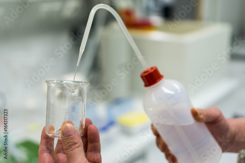 distilled water and glass in a laboratory environment