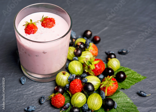 fresh juicy berries with milkshake  photo