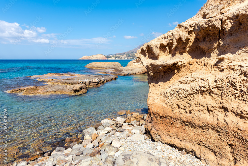 Rock formations on Firiplaka Beach, one of the most popular beach situated at the southern side in Milos island. Cyclades, Greece. 