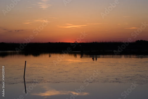 Sunset near Currituck Lighthouse in Outer Banks North Carolina photo