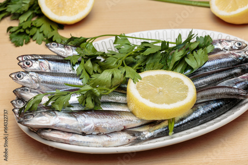 Dish of raw "boquerones", Mediterranean anchovies typical of Andalusian gastronomy. Healthy food.