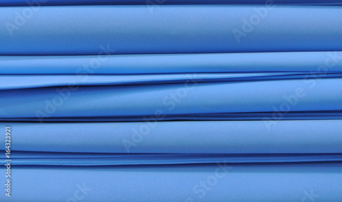 sheets of blue plastic material