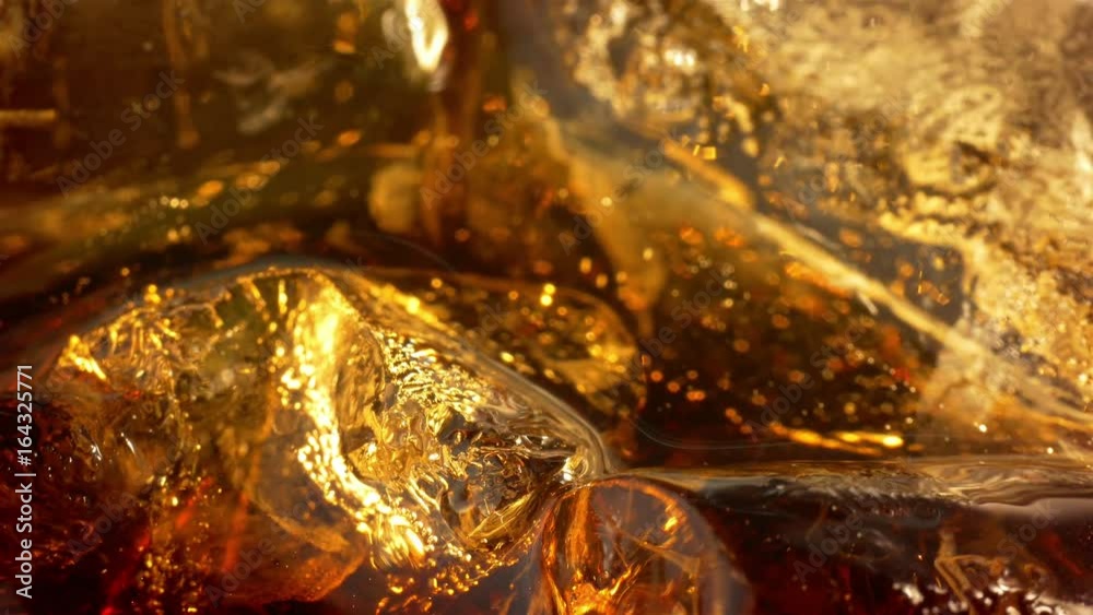 Video of cold cola with ice cubes in 4K Video of cold cola with ice cubes in 4K