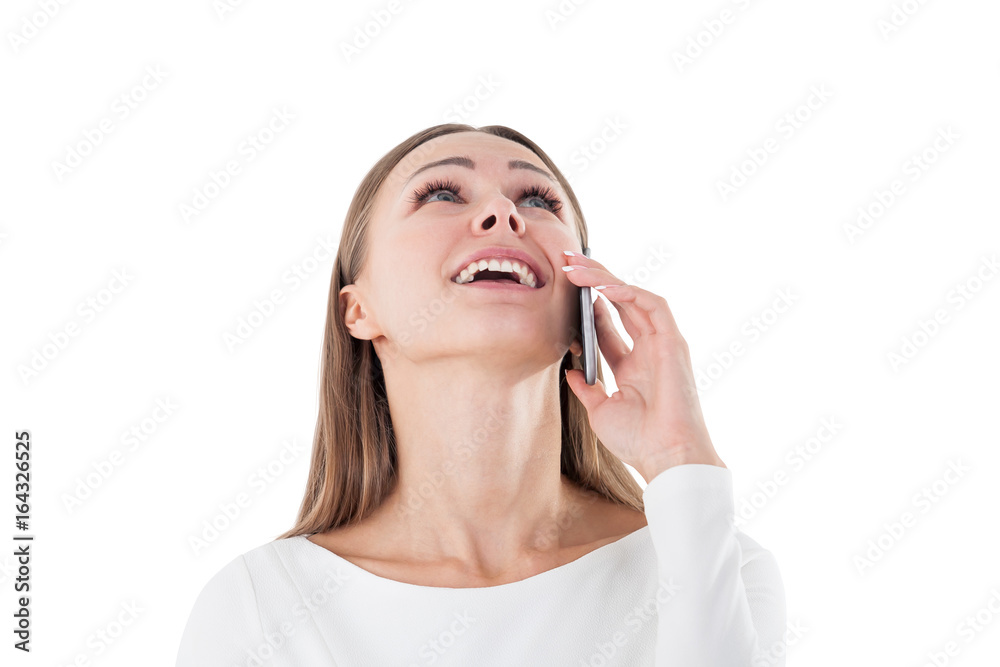 Happy businesswoman on phone looking up, isolated Happy businesswoman on phone looking up, isolated