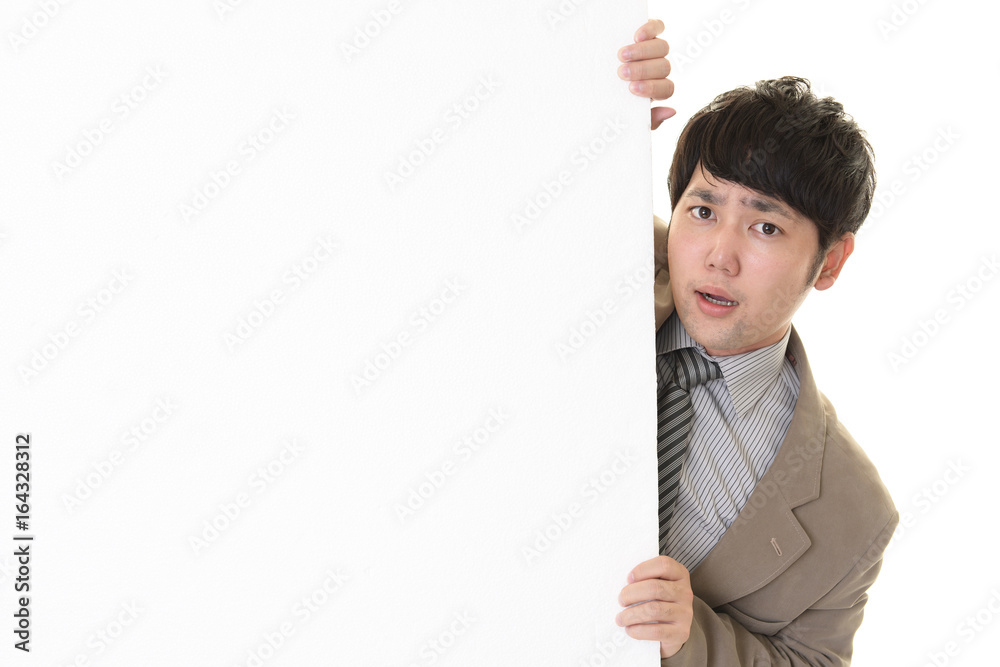 驚いた表情のビジネスマン 驚いた表情のビジネスマン