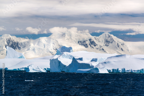 Icebergs, glaciers and mountains along the Antarctic Peninsula.