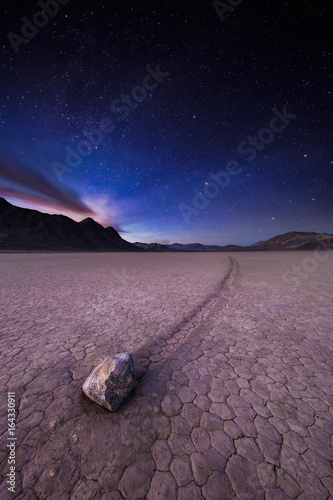 Sailing Rock in Racetrack Playa, Death Valley National Park Under a Field of Sparkling Stars