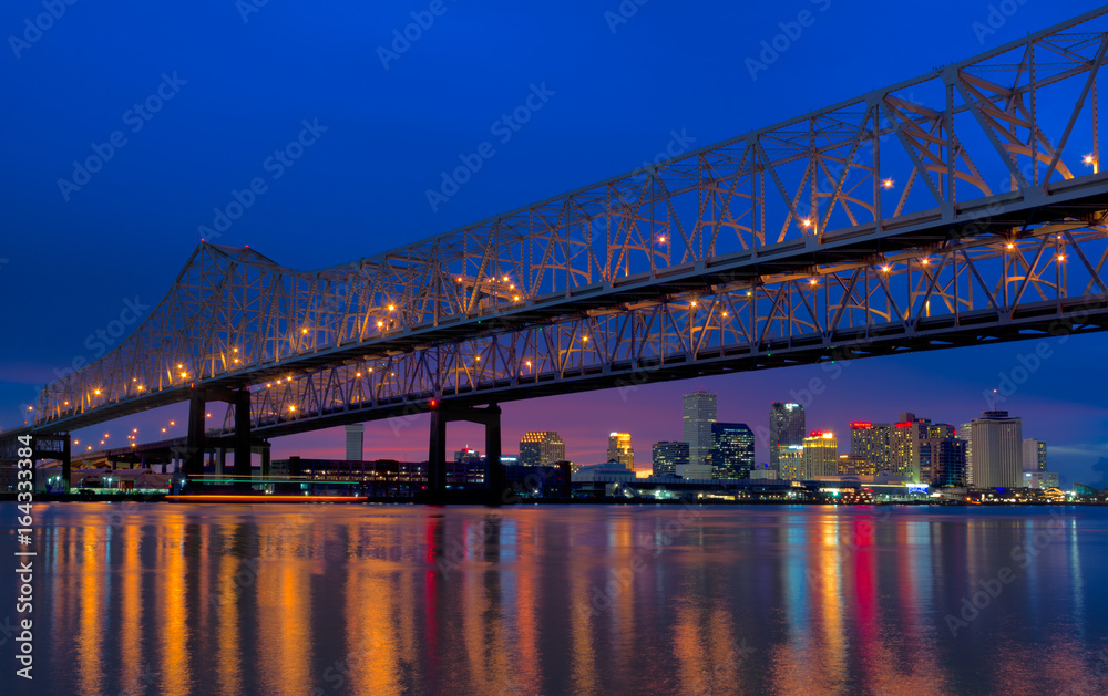 Mississippi river bridge over looking New Orleans downtown 