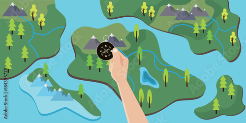 hand holding a compass on top of map to travel adventure