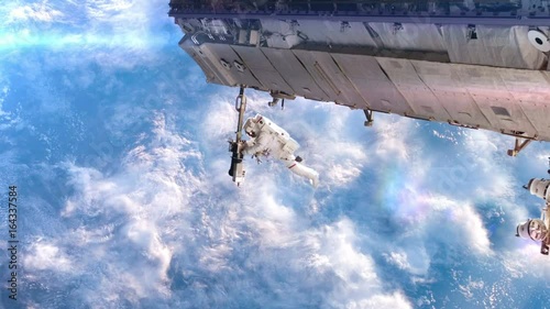 Astronaut making repairs on the International Space Station