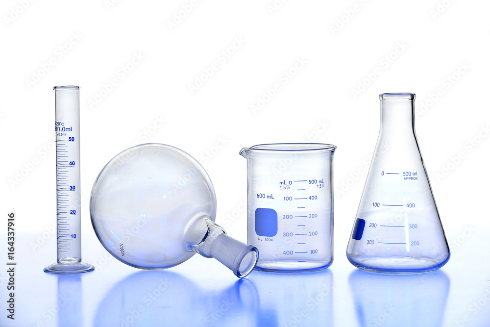 Laboratory Glassware on Reflective Table Laboratory Glassware on Reflective Table