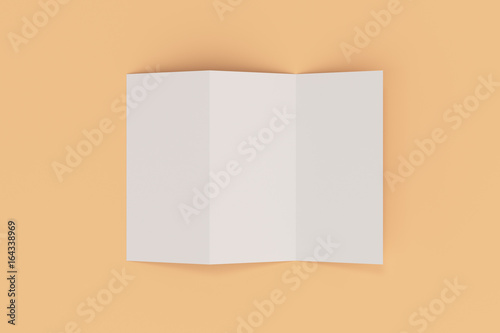 Blank white three fold brochure mockup on orange background