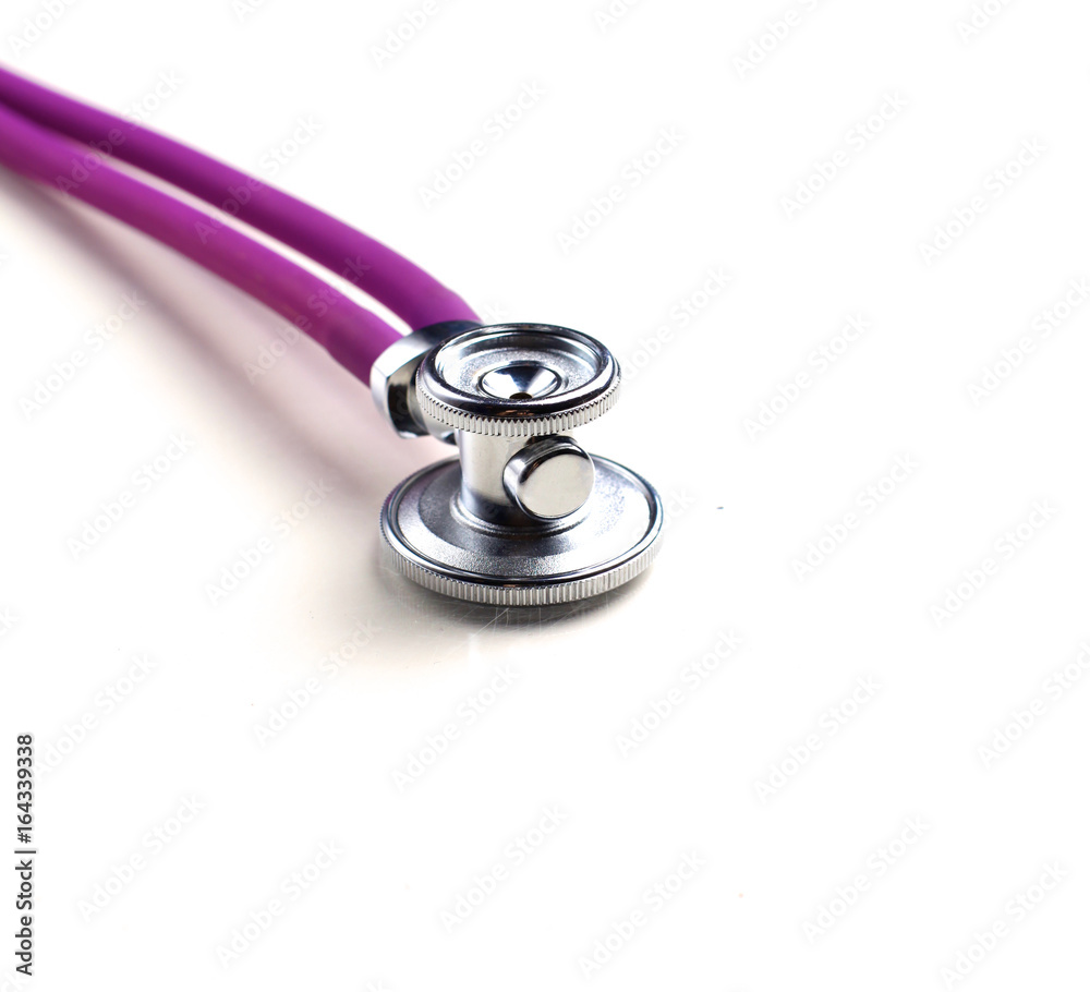 The stethoscope lies on the table. Close-up The stethoscope lies on the table. Close-up