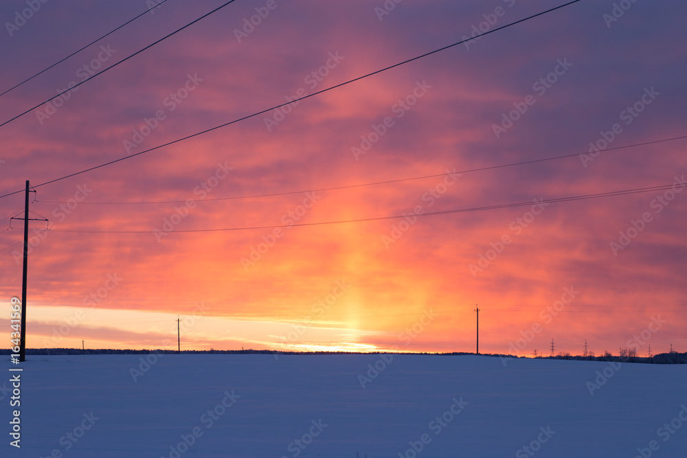 a power line frosty winter sunset