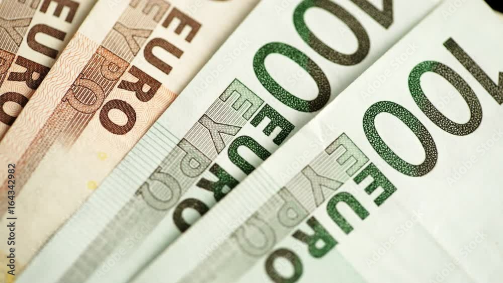 Nobody. Euro banknotes of different values. Euro cash money background. Dolly sliding shot 4K ProRes HQ codec Nobody. Euro banknotes of different values. Euro cash money background. Dolly sliding shot 4K ProRes HQ codec