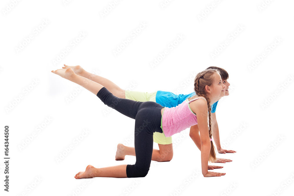 Young kids exercising on white background Young kids exercising on white background