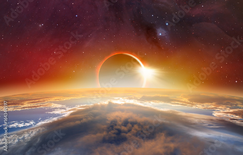 Tela Solar Eclipse Elements of this image furnished by NASA