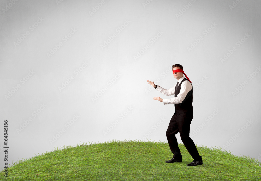 Blindfolded businessman